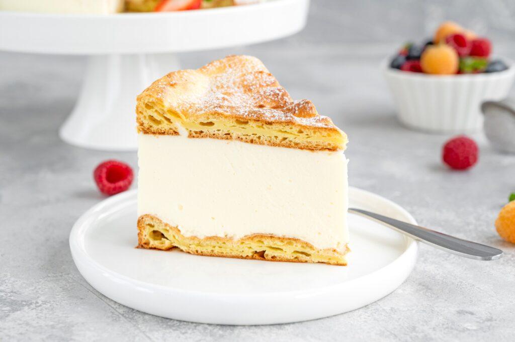 Polish cake Karpatka. Cake of choux pastry dough and custard cream with berries. Carpathian cake