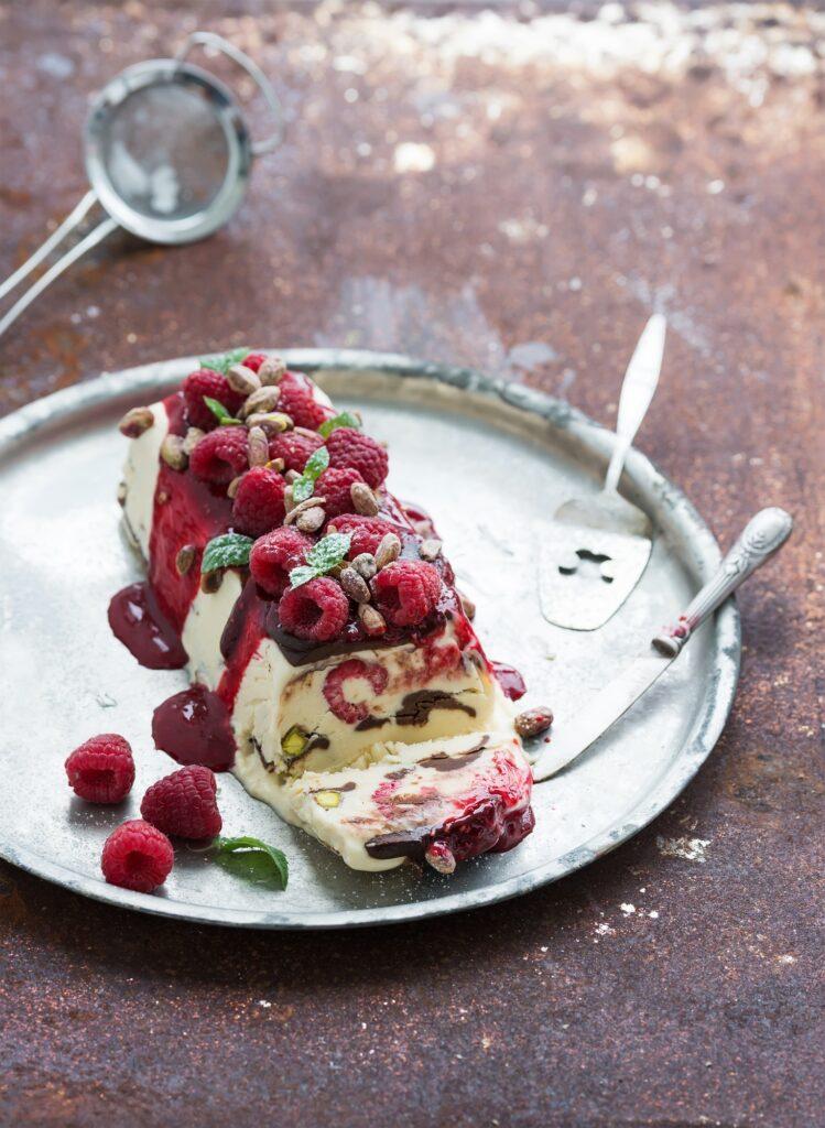 Semifreddo or italian cheese ice-cream dessert with pistachios