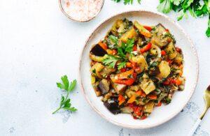 Vegetable stew, saute or caponata. Stewed eggplant with paprika, tomatoes, spices
