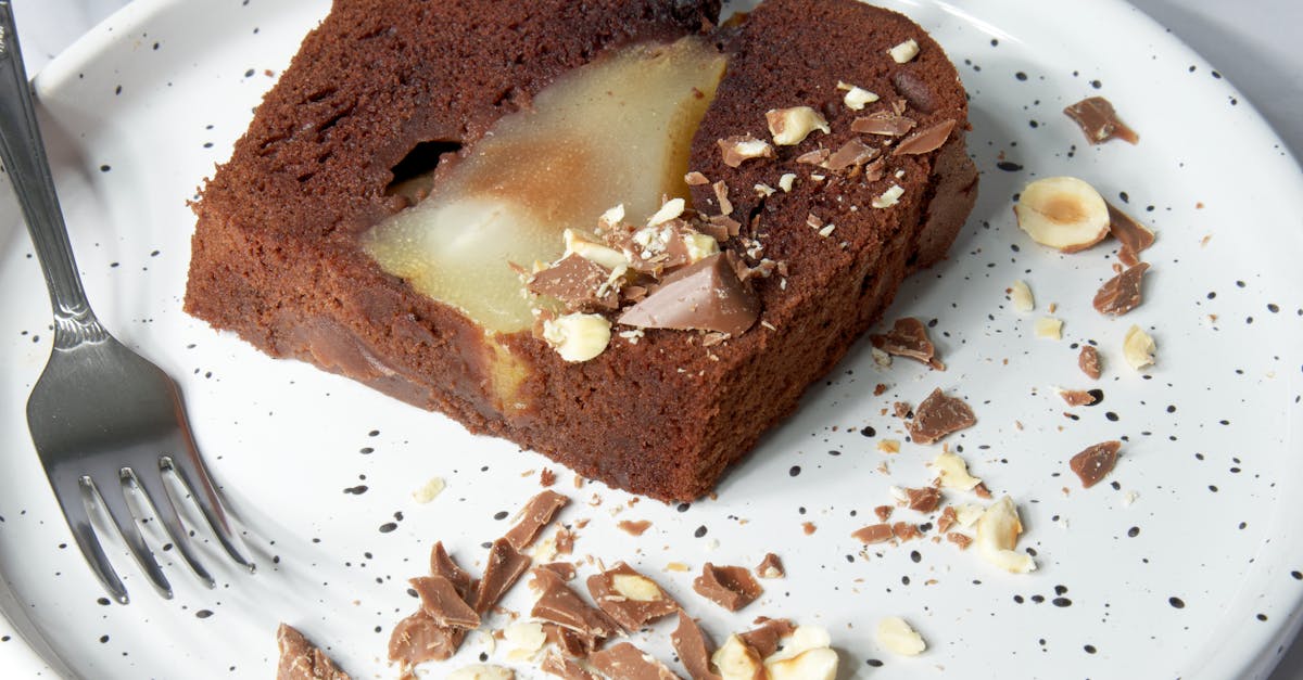découvrez notre savoureux gâteau aux prunes et noisettes, une délicieuse alliance de fruits juteux et de croquant. idéal pour vos desserts, ce gâteau régalera vos papilles à chaque bouchée. parfait pour les occasions spéciales ou un goûter gourmand !