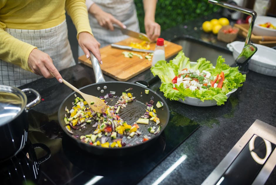 Fresh ingredients and cooked vegetables prepared for a family meal