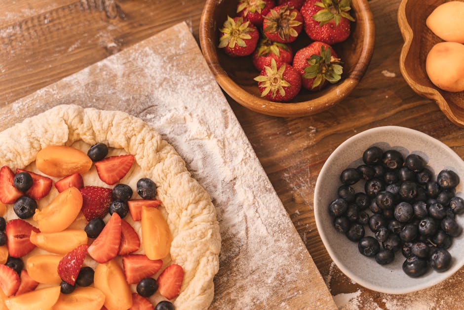 Rustic homemade fruit tart with spring berries